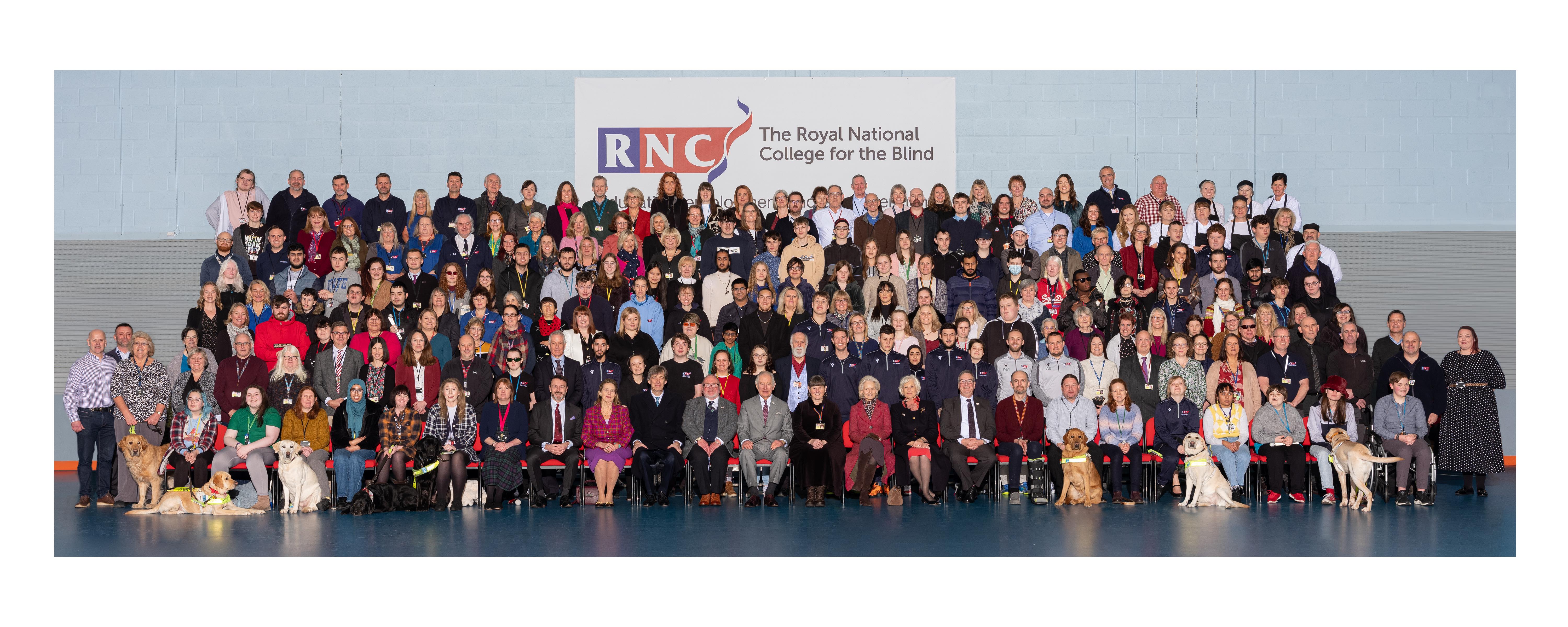  staff, students, governors and volunteers group photo with the King